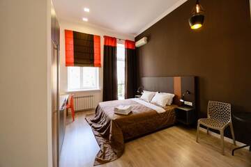 Апартаменты с балконом в Апартаментах Partner Guest House Baseina